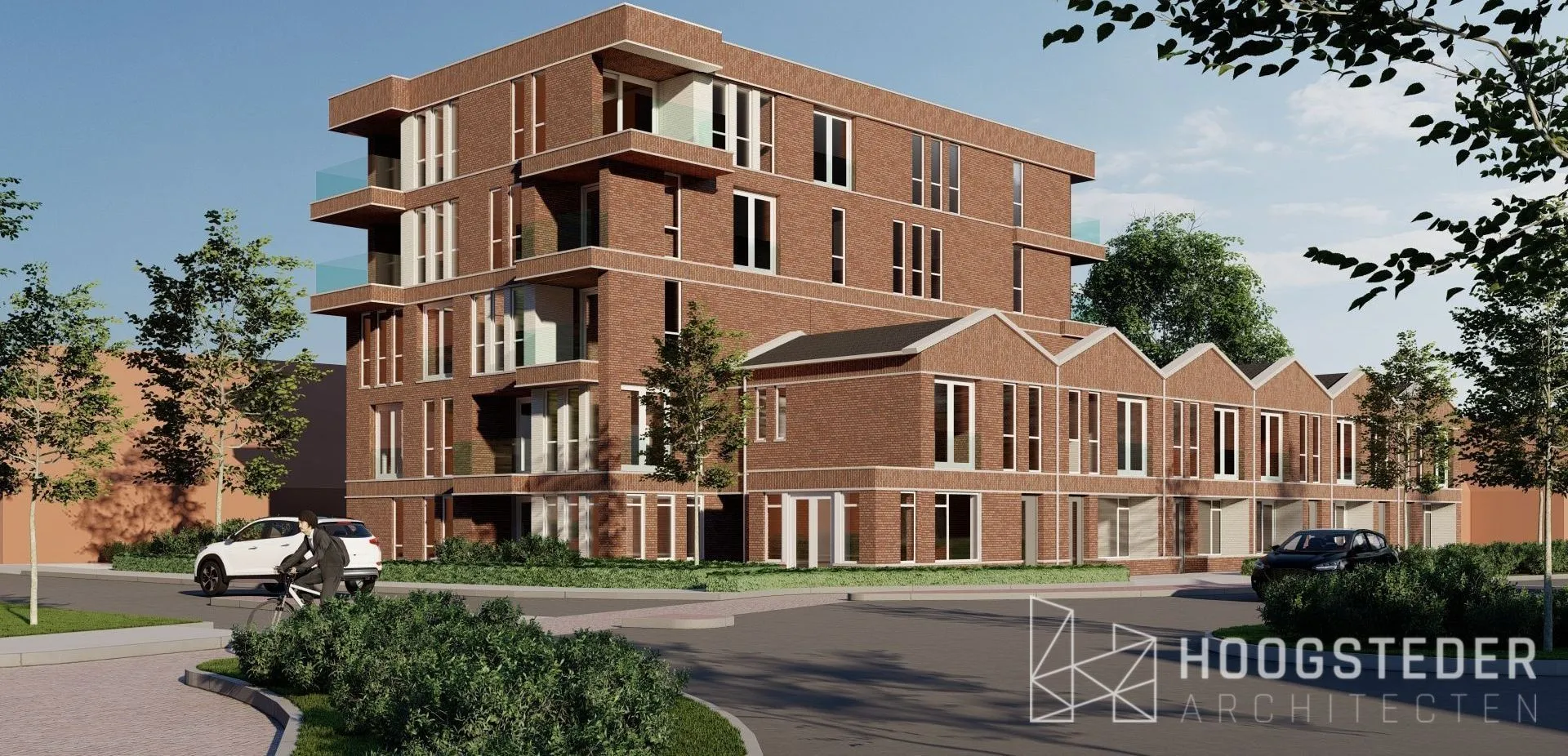 Appartementengebouw in rode baksteen met terugliggende balkons naast een rij lagere woningen